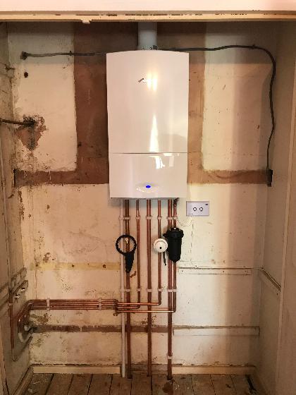 Warm air system removed & 7 Rad system fitted, with a Worcester 30i, Vertical flue & smart controls, all with a 10 year guarantee. It will look lovely once the customer adds a lick of paint to the airing cupboard